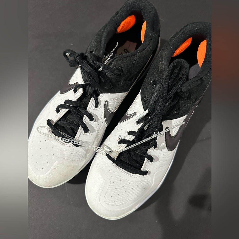 Nike Air Huarache black and white base ball cleats